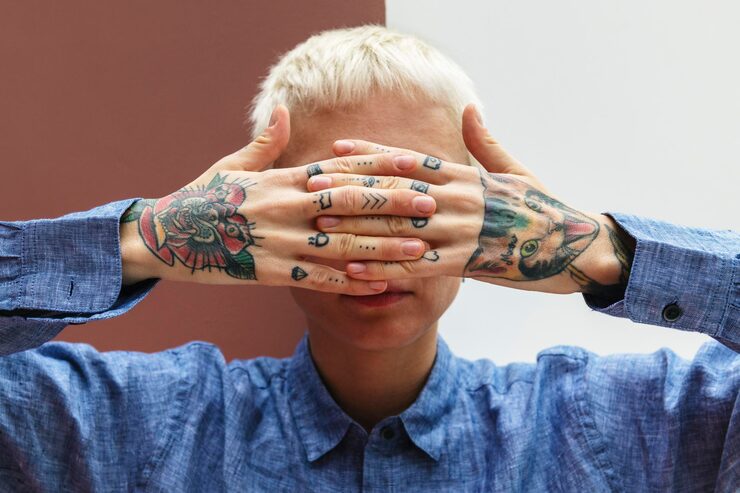 semicolon mental health tattoo on palm symbolizing depression survival and awareness